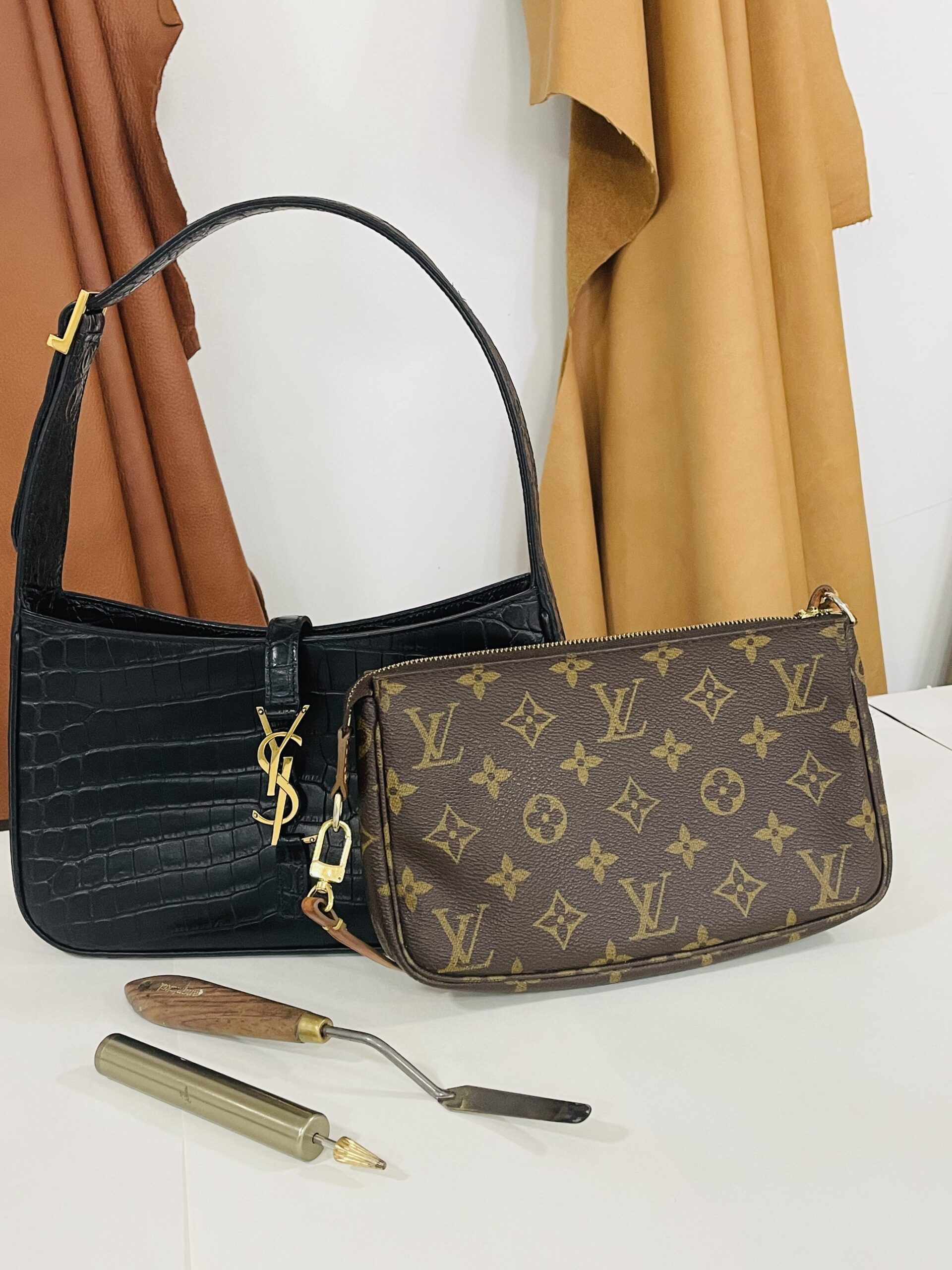 Yves Saint Laurent Black with Gold Purse and Louis Vuitton Purse